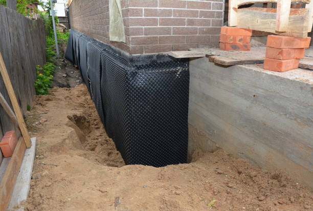 Happy homeowners after waterproofing job in Mantua